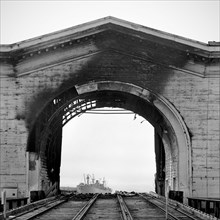 Burned arch over railroad tracks