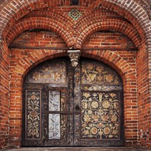 Ornate arches over cathedral doors