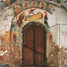 Paintings over arched door