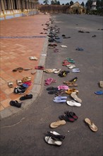 High angle view of sandals outside Buddhist temple
