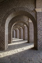 Brick archways in restored amphitheater