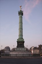 Low angle view of Colonne de Juillet in Paris city center
