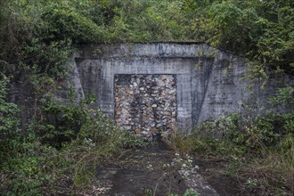Bricked up bunker in abandoned military base