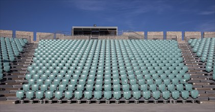Empty chairs in outdoor amphitheater
