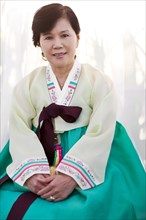 Woman in traditional Asian clothing