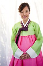 Woman in traditional Asian clothing