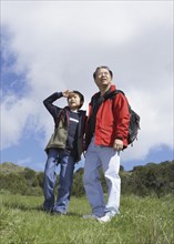 Asian father and son outdoors