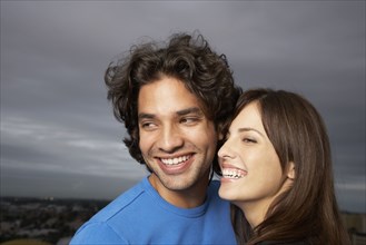 Close up of Hispanic couple smiling