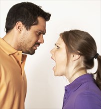 Mixed Race woman yelling at boyfriend