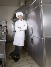 Asian male chef in kitchen