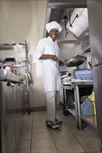 African American male chef in kitchen