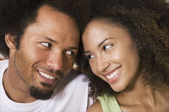 African couple smiling at each other