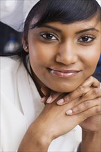 Close up of Mixed Race female pastry chef