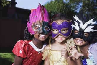 African girls wearing masks