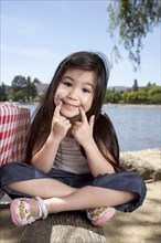Girl smiling at picnic