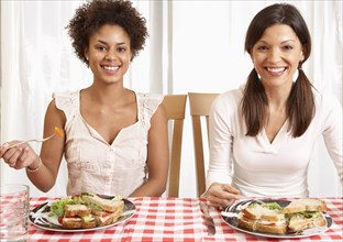 Women eating dinner together