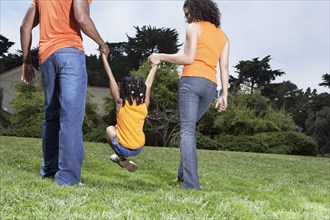 Family playing together in park