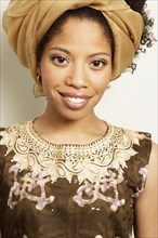 Mixed race woman wearing turban