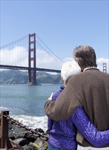 Senior Caucasian couple admiring Golden Gate Bridge