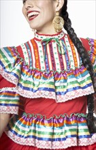 Hispanic woman wearing traditional clothing