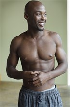 Portrait of bare chested African man