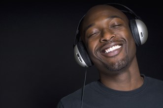 Portrait of African man wearing headphones