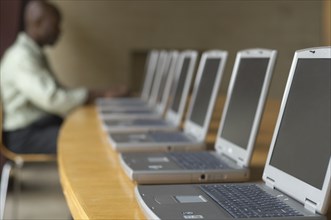 African man using laptop at computer lab