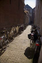 Bicycles parked in Dutch alley