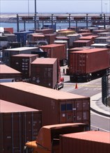 Trucks in queue at shipping terminal