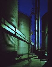 Storage silos at night