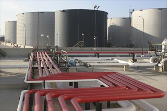 Red pipes and storage tanks