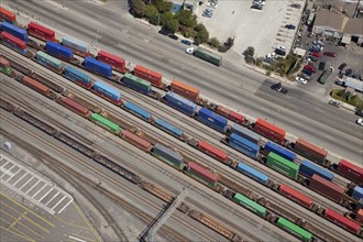 Aerial view of cargo containers on railroad tracks