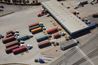 Aerial view of cargo containers on semi-trucks
