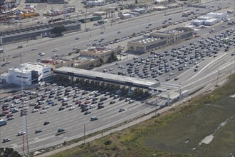 Aerial view of cars at toll plaza