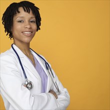 Studio shot of female African doctor