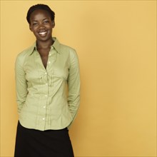 Studio shot of African woman smiling