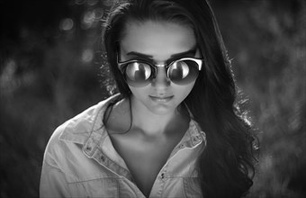 Portrait of Caucasian woman wearing sunglasses