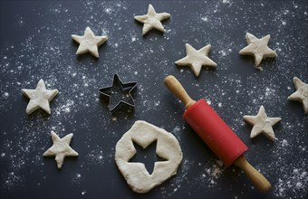 Rolling pin and star-shaped pastry cutter for cookies