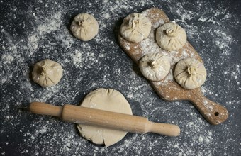 Flour on rolling pin and dough