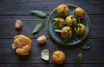 Oranges on wooden table