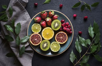 Plate of sliced fresh fruit