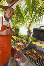 African man barbecuing