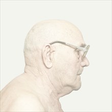 Older Caucasian man wearing glasses