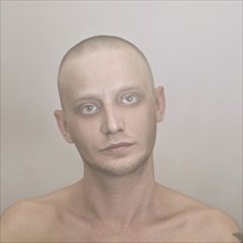 Close up of Caucasian man with shaved-head