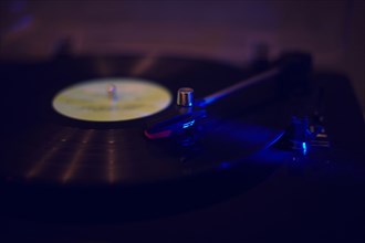Close up of turntable playing vinyl record