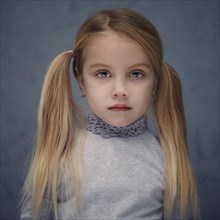 Caucasian girl with pigtails