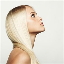 Profile of Caucasian woman looking up