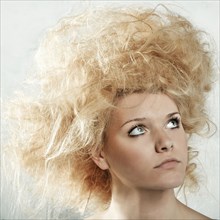 Caucasian woman with fluffy hairstyle
