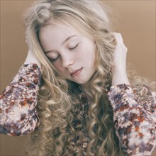 Portrait of Caucasian teenage girl with blonde hair
