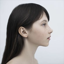 Profile of Caucasian girl with long hair